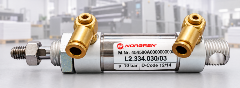 Pneumatikzylinder L2.334.030/03 vor dezentem Druckmaschinenhintergrund